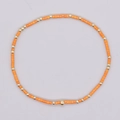Pulsera boho hecha a mano con cuentas de tubo naranjas y bolas de cobre doradas - Cuentas de Columna Rojo Naranja Oro