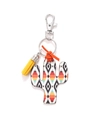 Detail of wooden cactus keychain with Aztec pattern print and yellow tassel fringe - Aztec Texture Cactus/Yellow Tassel