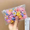 Nylon hair ties set for kids featuring pink flower, rainbow and star charms - Crown (20 Pcs)