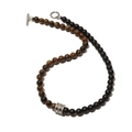 Close-up of 8mm tiger eye and matte obsidian beads necklace with silver toggle clasp - 8mm Bead / Tiger Eye + Matte Stone