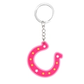 Pink horseshoe keychain with white stars and yellow dots on a silver metal chain - Horseshoe