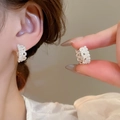 Close-up of crown lace pearl earrings on ear showing elegant silver hollow design - 77# Ear Buckle - Silver Lace With Pearl