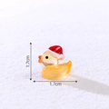 Miniature Christmas duck figurine in yellow resin with red hat for DIY snow landscapes - Luminous Orange