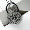 Luxury heart-shaped evening bag featuring encrusted rhinestones and a black handle ring - Black Heart Bag with Vertical Triangle Crystals