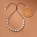 Bohemian seashell necklace with white shells and black hand-woven rope on a rustic background - By0011 - Black Seashell Necklace