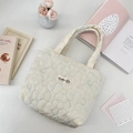 Close-up of cream quilted tote bag featuring floral stitching and sozakka brand label - Multicolor Large Flower