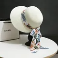 Cappello da sole da donna in paglia bianco crema con lungo nastro di seta a fiori da spiaggia - M (56-58cm) / Crema Nastro Stampato