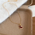 Detail of gold plated rocking horse necklace with red enamel and pavé zircon stones - Necklace (Gold-Red)