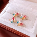 Macro shot of colorful zircon butterfly earrings on a beige velvet jewelry box - Silver Needle - Gold - Butterfly (Multi-color Zircon)