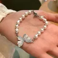 Elegant pearl bracelet featuring a silver butterfly pendant with sparkling zircons - White Pearl Zirconia Butterfly (5#)