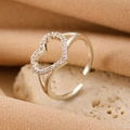 Adjustable silver open ring featuring a sparkling heart-shaped cubic zirconia pave setting - Silver Dual Heart Ring (11219)