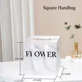 White square gift bag with FLOWER text and silk handle, dimensions 27.5x27.5cm - FLOWER (Square) / 27.5x27.5x27.5cm