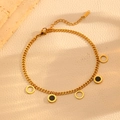 Detail of 316L stainless steel gold bracelet with Roman numeral and open ring charms - Black Shell Round Gold Bracelet (T208)
