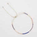 Bohemian handmade beaded bracelet featuring navy, rose gold, and cream beads with adjustable cord - Dark Blue Rose Gold Cream Beads (MI-B220140I)
