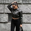 Women's cropped PU leather jacket in black with lapel collar and zipper for street style - S / Black