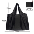 Foldable black Oxford fabric shopping bag with wide handles and compact folded view - Classic Black