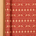Dark red Christmas wrapping paper roll with reindeer, bells, and snowflake patterns - Elk Bell