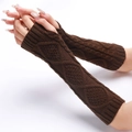 Detailed knit texture of dark brown cable-stitch fingerless gloves on arms - One Size / Coffee