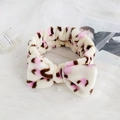 Leopard print plush headband with large bow in white, pink, and brown tones - Pink Dots Yellow Circle Leopard