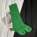 Vibrant green ribbed knit calf socks in high-elastic cotton displayed on minimalist background - Calf-length Fruit Green