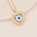 Close-up of gold heart pendant with pavé crystals and blue devil eye design on gold chain - Bright Blue Devil Eye (4#)