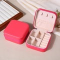 Portable rose red PU leather jewelry box with zipper and interior ring slots - Strawberry Red