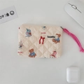 Close-up of quilted floral cosmetic bag featuring cute animal patterns and a pink zipper pull - Beige Doll