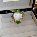 Golden hummingbird brooch with green head, heart-shaped shell inlay and crystal arrow - 14K Gold Plated Bird Heart Zirconia Brooch
