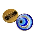 Blue evil eye brooch pins set with gold star detail and bronze metal backing - Bronze-4