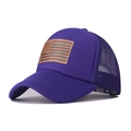Detail of purple trucker hat featuring US flag patch and breathable mesh back - Purple