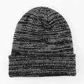 Detailed knit texture of a black and white marled winter beanie with ribbed cuff - L (58-62cm) / Black and White Mixed