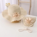 Close-up of beige straw sun hat and matching crossbody bag with 3D floral accents - Hat + Bag Set / Beige