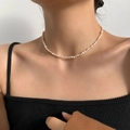 Baroque natural freshwater pearl necklace with 14K gold plated clasp worn by model - Small Baroque Pearl
