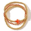Dreiteiliges goldenes Perlenarmband-Set mit rotem Kreuzanhänger für Damenmode - Kreuz 3-Teiliges Set / Gold/Rot