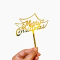 Detailed view of shiny gold acrylic Merry Christmas cake topper with cursive lettering - Single-layer Merry Christmas