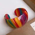 Macro detail of rainbow striped resin wide open bangle with polished vibrant finish - 38# Bangle-Colorful-Acetate Plate