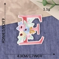Floral letter E embroidery patch with pink and blue blossoms for clothing decor - Letter E / Hot Melt Adhesive