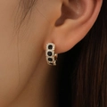 Golden huggie earrings with square black stones and white micro-pave crystals - Gold Huggie Earrings with Square Black Stones