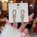 Elegant gold flower tassel earrings with S925 silver needles and sparkling crystals - E0035 Gold Silver Needle (Petal Radiating Tassel Gold)