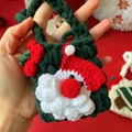 Handmade forest green crochet Santa Claus mini bag charm with red bow detail - Santa Claus Style Bag / One Size