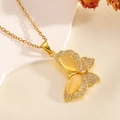 Detail of gold bow necklace with yellow cat eye stone and micro-inlaid zircons - Gold Bowknot Stone Inlaid Necklace