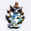 Resin souvenir fridge magnet featuring Saipan theme with helm, anchor and seagulls - Ship Rudder Seagull USA