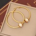 Close-up of golden stainless steel hoop earrings with a sparkling rhinestone-set bead - Round Shape (4#)