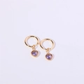 Elegant gold hoop earrings with heart-shaped purple zirconia pendants on white background - June/Alexandrite Purple