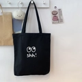 Bolso tote de lona negra con estampado de ojos blancos y colgante de nube de felpa - Negro