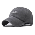 Detailed embroidery of white cheers text on a washed grey cotton baseball cap - Adjustable / Washed Grey