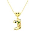 Macro shot of gold heart pendant and rainbow crystal paved letter J on a fine chain - Letter-J