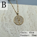 Macro view of a 20mm gold Virgin Mary pendant necklace with zircon on stone background - B-Crucifixion Icon