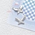 Macro view of matte silver butterfly pendant for DIY jewelry with 20mm x 15.5mm dimensions - 1# Frosted Silver Butterfly