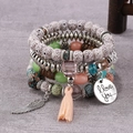 Bohemian multi-layer beaded bracelet with blue beads, wing charm and pink tassel - Light Mix